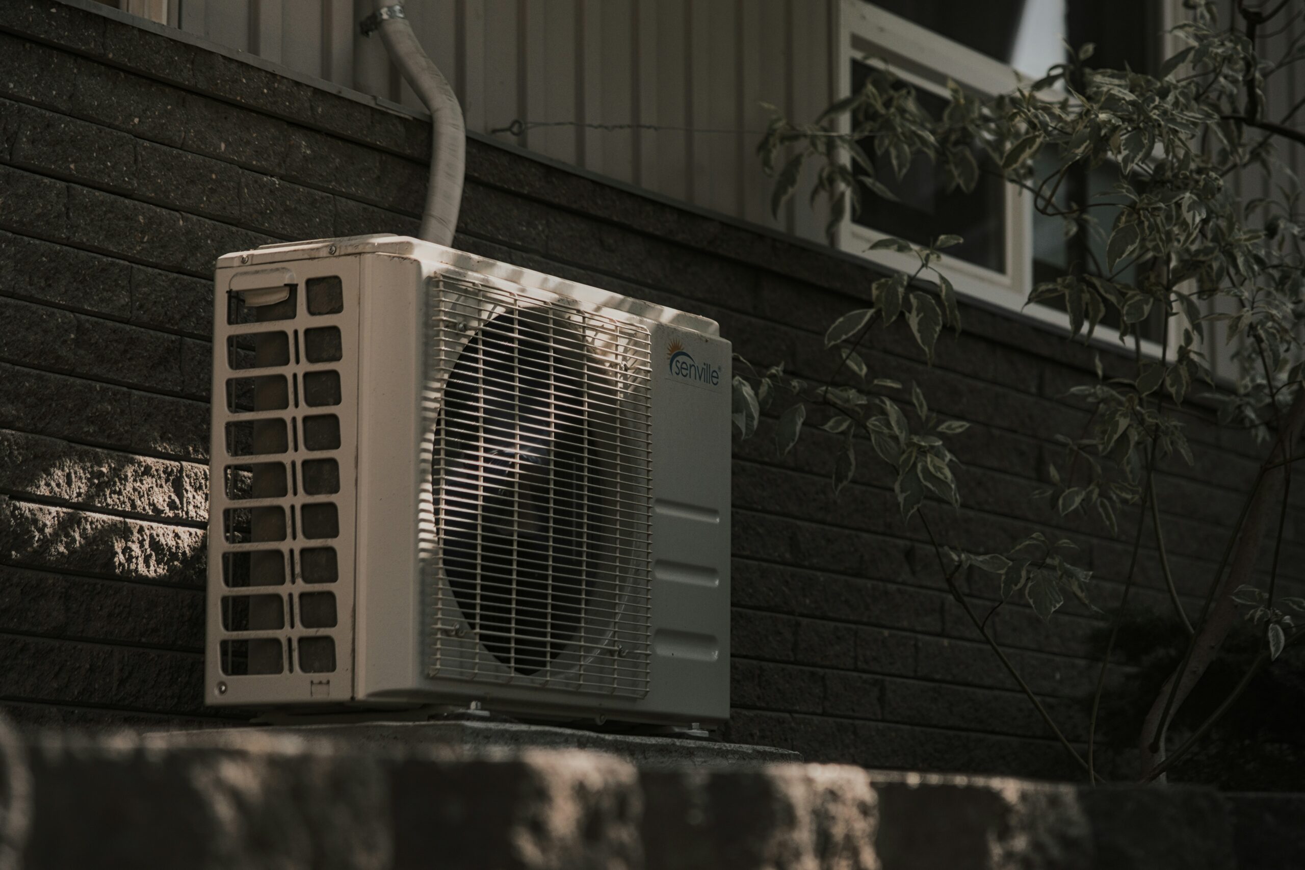 Urban House technician installing a split AC unit in a Dubai apartment